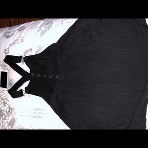 black dress with overall looking straps super cute